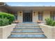 Front entrance with dark door and brick steps at 4370 Harris Trl, Atlanta, GA 30327