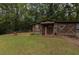 Rustic wooden outbuilding with double doors and a quilt square at 6425 Mixon Rd, Chattahoochee Hills, GA 30268