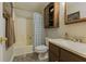 Updated bathroom with a tub, wood vanity, and built-in shelving at 6425 Mixon Rd, Chattahoochee Hills, GA 30268