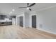Finished basement with gray cabinets, wood-look flooring, and recessed lighting at 1264 Six Sisters St, Dacula, GA 30019