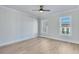 Spacious bedroom with hardwood floors and ample natural light at 1264 Six Sisters St, Dacula, GA 30019