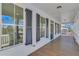 Exterior view of home with spacious covered porch and shutters at 1264 Six Sisters St, Dacula, GA 30019