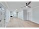 Finished basement with light wood floors, recessed lighting, and a small kitchen area at 1274 Six Sisters St, Dacula, GA 30019