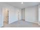 Empty bedroom with carpet and a walk-in closet at 1274 Six Sisters St, Dacula, GA 30019