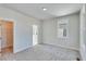 Unfurnished bedroom with ensuite bathroom and walk-in closet at 1274 Six Sisters St, Dacula, GA 30019