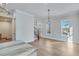 Dining room with large windows and hardwood floors at 1274 Six Sisters St, Dacula, GA 30019