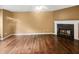 Living room featuring hardwood floors and a fireplace, creating a cozy atmosphere at 1839 Broadway St, Decatur, GA 30035