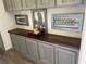 Kitchen counter with decorative metal wall art at 160 Scott Rd, Canton, GA 30115