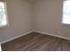 Bright bedroom with wood-look flooring and window at 2341 Baywood Se Dr, Atlanta, GA 30315