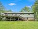 Ranch house with large deck and spacious backyard at 1008 Wiley Bridge Rd, Woodstock, GA 30188