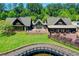 Community clubhouse with patio overlooking a pond at 962 Chattooga Trce, Suwanee, GA 30024