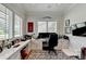 Bright office with built-in workspace and large window at 962 Chattooga Trce, Suwanee, GA 30024