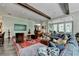 Open living space featuring comfortable seating and a large TV at 962 Chattooga Trce, Suwanee, GA 30024