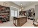 Large walk-in closet with custom shelving and island at 962 Chattooga Trce, Suwanee, GA 30024