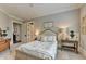 Charming bedroom with a rustic bed frame and large window at 962 Chattooga Trce, Suwanee, GA 30024