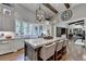 Gourmet kitchen with marble countertops, large island, and high-end appliances at 962 Chattooga Trce, Suwanee, GA 30024