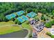 Community tennis courts with clubhouse and pool at 962 Chattooga Trce, Suwanee, GA 30024