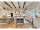 Gourmet kitchen boasts a large island, custom cabinetry, and top-of-the-line appliances at 962 Chattooga Trce, Suwanee, GA 30024