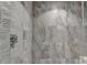 Modern shower with grey marble tile at 962 Chattooga Trce, Suwanee, GA 30024