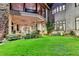 Home exterior at night with a beautifully landscaped yard at 962 Chattooga Trce, Suwanee, GA 30024