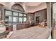 Gray custom cabinetry home bar with granite countertops and wine cooler at 962 Chattooga Trce, Suwanee, GA 30024