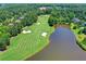 Golf course with water features and lush fairways at 962 Chattooga Trce, Suwanee, GA 30024