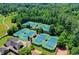 Aerial view of numerous well-maintained tennis courts at 962 Chattooga Trce, Suwanee, GA 30024