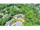 Luxury home nestled in a wooded community with a circular driveway at 962 Chattooga Trce, Suwanee, GA 30024