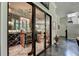 Impressive wine cellar with glass doors and extensive storage at 962 Chattooga Trce, Suwanee, GA 30024