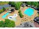 Expansive pool area with water slide and kiddie pool at 962 Chattooga Trce, Suwanee, GA 30024