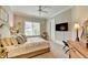 Spacious bedroom with a ceiling fan, large window and plenty of light at 962 Chattooga Trce, Suwanee, GA 30024