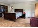 Primary bedroom with walk-in closet and hardwood floors at 2023 Lee Dr, Austell, GA 30168
