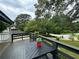 Spacious deck with black railings, offering outdoor entertaining space at 2023 Lee Dr, Austell, GA 30168