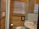Clean bathroom with wood walls and a glass shower at 2023 Lee Dr, Austell, GA 30168
