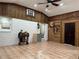 Relaxing sunroom with wood paneling, tile flooring, and a rustic feel at 2023 Lee Dr, Austell, GA 30168