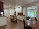 Open concept kitchen with island and view to living room at 2023 Lee Dr, Austell, GA 30168