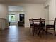 Kitchen with open dining area and view to living room at 2023 Lee Dr, Austell, GA 30168