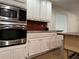 Modern kitchen boasting stainless steel appliances and white shaker cabinets at 2023 Lee Dr, Austell, GA 30168
