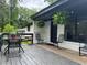 Inviting front porch with black door and white brick exterior at 2023 Lee Dr, Austell, GA 30168