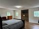Bright bedroom with hardwood floors and a large window at 2023 Lee Dr, Austell, GA 30168