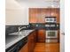 Modern kitchen with stainless steel appliances at 230 E Ponce De Leon Ave # 322, Decatur, GA 30030