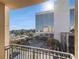 View from patio shows courtyard, parking, and a modern building at 230 E Ponce De Leon Ave # 322, Decatur, GA 30030