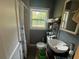 Clean bathroom, featuring a shower, toilet, and modern sink at 286 Pauladean Se Cir, Marietta, GA 30067
