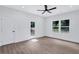 Well-lit bedroom with backyard access and stylish flooring at 2000 Grove Ave, East Point, GA 30344