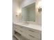 Modern bathroom vanity with quartz countertop and sleek fixtures at 1235 Mount Paran Nw Rd, Atlanta, GA 30327