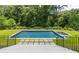 Inviting rectangular pool with spa and stone coping at 1235 Mount Paran Nw Rd, Atlanta, GA 30327