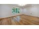 Spacious bedroom with hardwood floors and large windows at 1235 Mount Paran Nw Rd, Atlanta, GA 30327