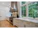 Modern kitchen with marble countertops and stainless steel appliances at 1235 Mount Paran Nw Rd, Atlanta, GA 30327
