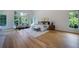 Main bedroom with hardwood floors, fireplace, and abundant natural light at 1235 Mount Paran Nw Rd, Atlanta, GA 30327