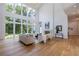 Bright living room with hardwood floors, high ceilings, and large windows at 1235 Mount Paran Nw Rd, Atlanta, GA 30327